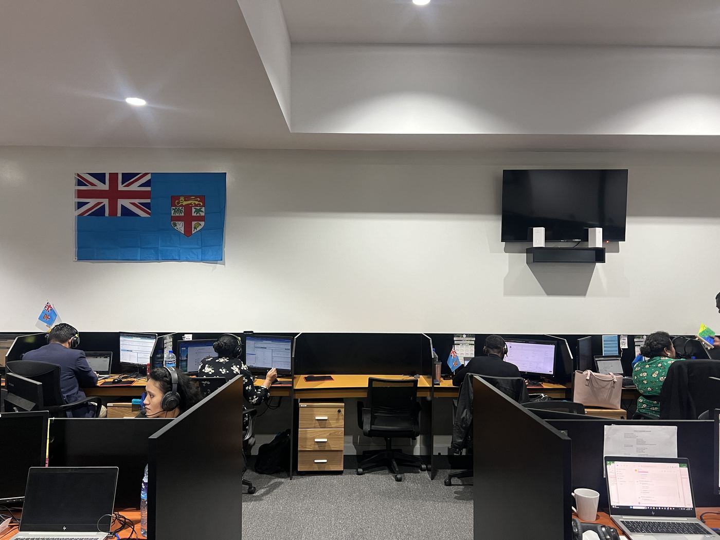 24/7 CCTV multi-camera security monitoring station inside the PCS Suva office